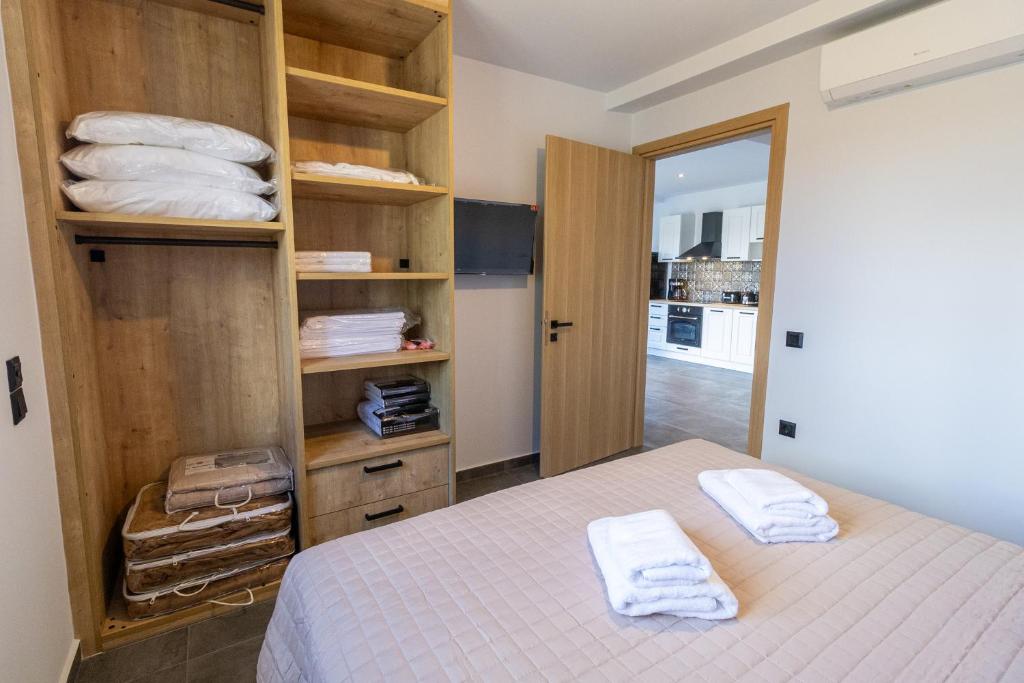 Postel nebo postele na pokoji v ubytování Pecora Nera apartments