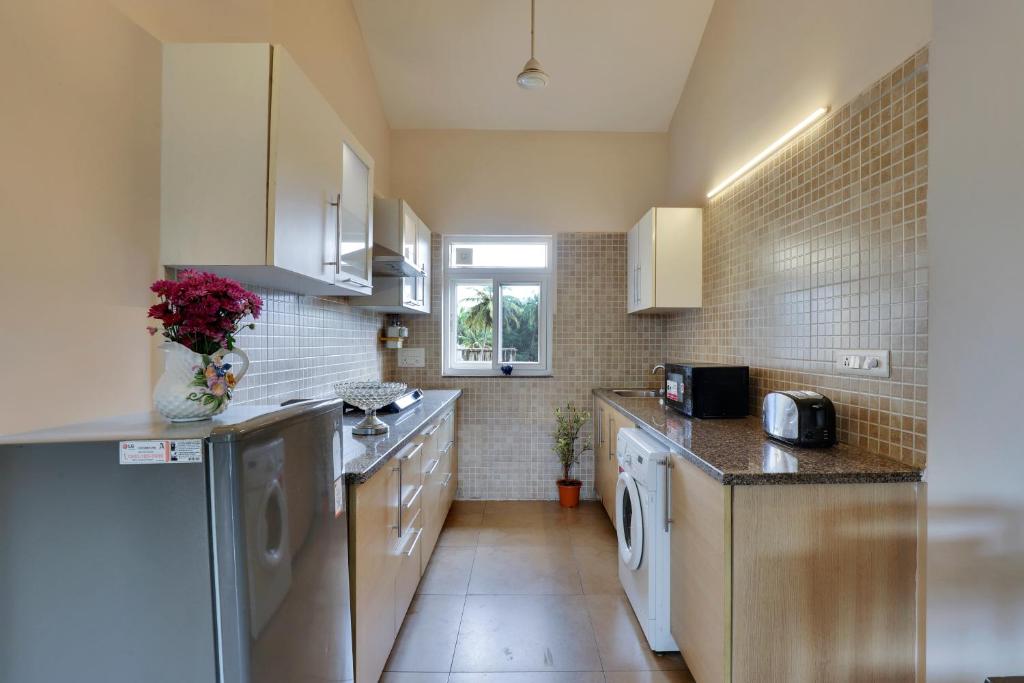 Kuchyň nebo kuchyňský kout v ubytování Veera Strand Park Serviced Apartments near Calangute
