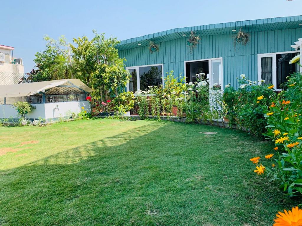 Zahrada ubytování Vandana's Bed and breakfast