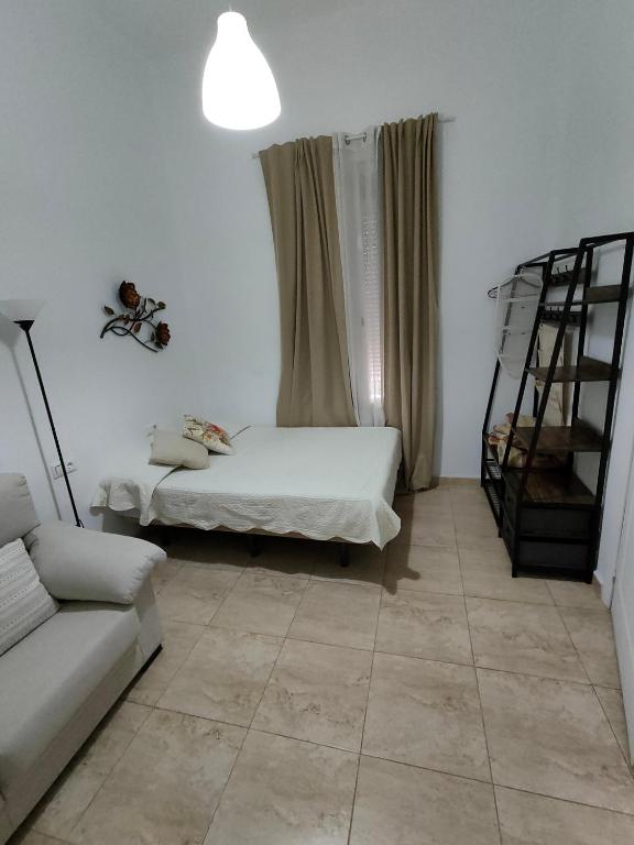 Posteľ alebo postele v izbe v ubytovaní El Palo Estudio