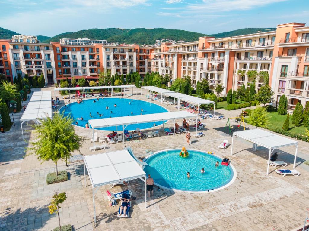 an overhead view of a swimming pool in a resort at Prestige Mer d'Azur in Sunny Beach