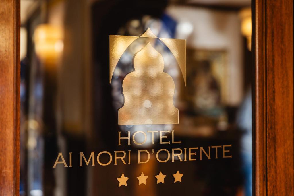 a sign for a hotel at a moroccan store at Ai Mori d&#39;Oriente in Venice