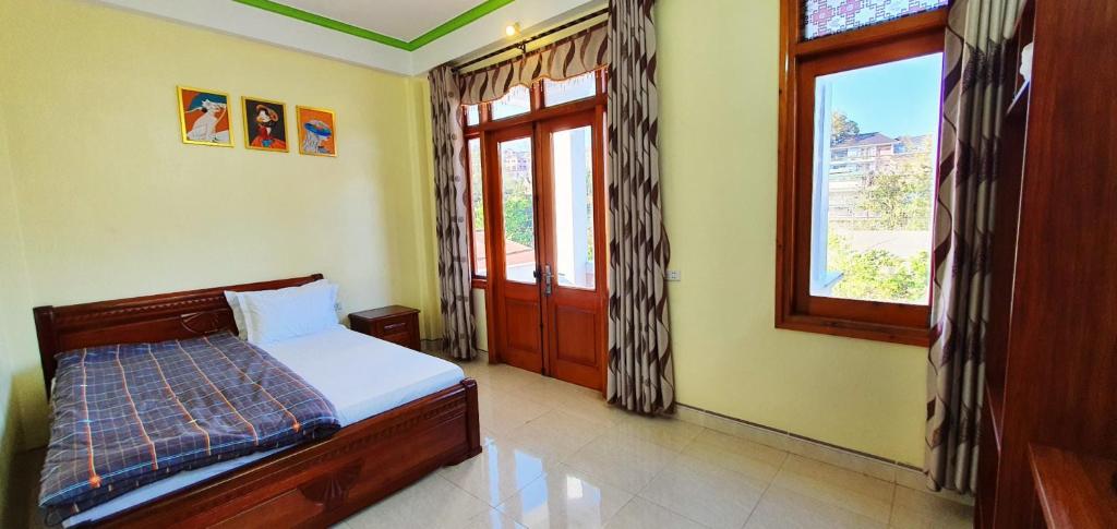 Postel nebo postele na pokoji v ubytování Đăng Dương Motel