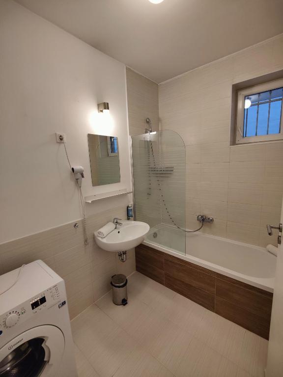 Kúpeľňa v ubytovaní Corvin Plaza Apartments & Suites