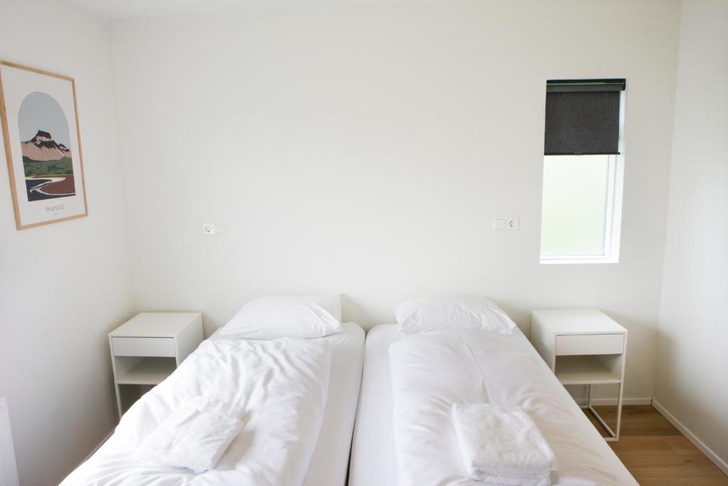 Voodi või voodid majutusasutuse Eiðar - Apartments toas