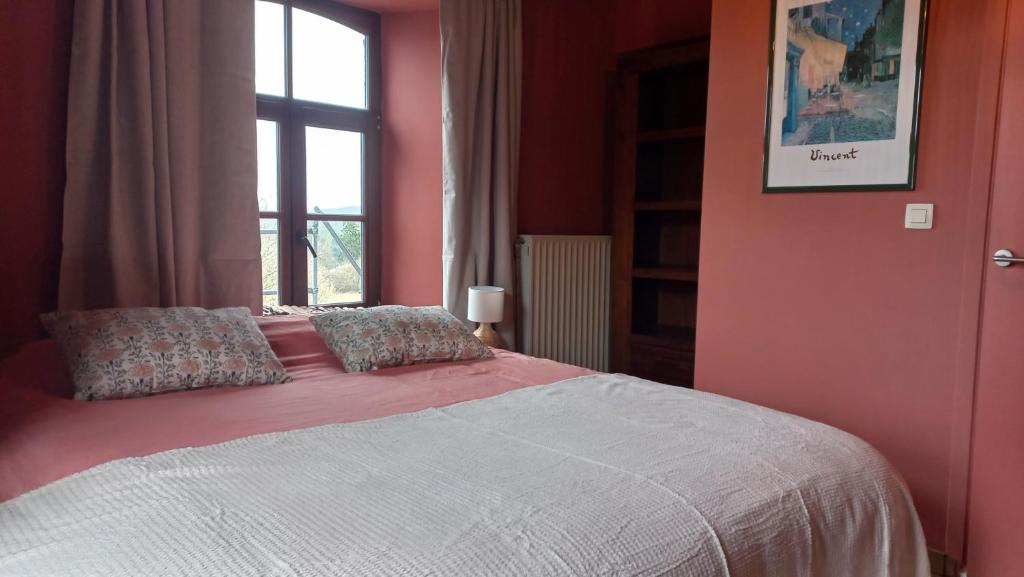 Postel nebo postele na pokoji v ubytování B&B Ferme1883