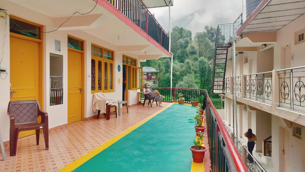 a swimming pool in the middle of a house at Sweet Dreams in Dharamshala