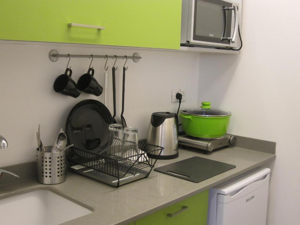 Kuchyň nebo kuchyňský kout v ubytování G38 Rental Apartment Building