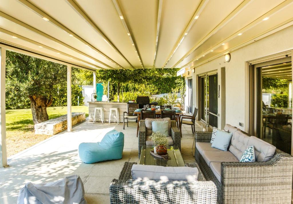 Posedenie v ubytovaní A&A Luxury Beach Villas