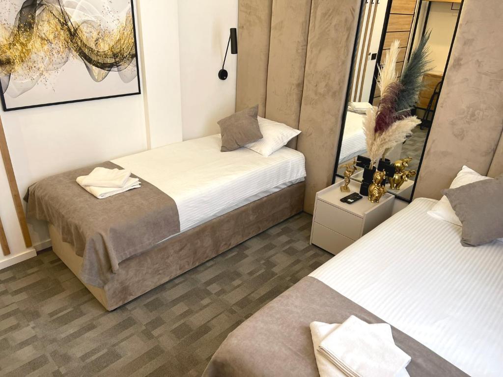 Postel nebo postele na pokoji v ubytování Hotel NPL CODE