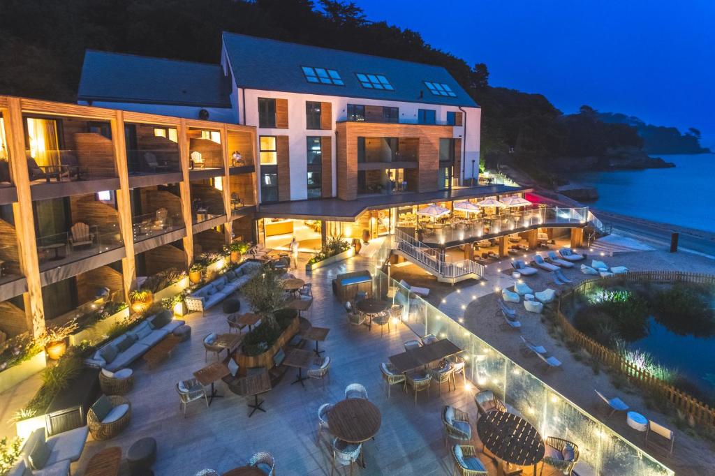 an aerial view of a hotel with a pool at Harbour Beach Club, Hotel & Spa in Salcombe