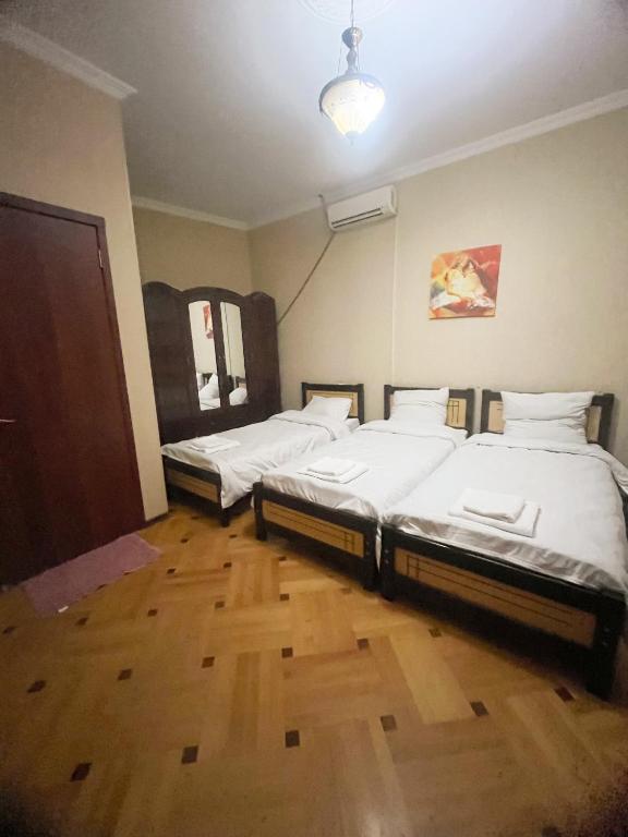 Postel nebo postele na pokoji v ubytování Hotel Vila