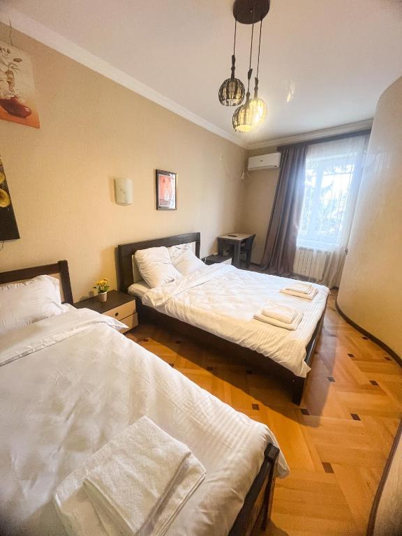 Postel nebo postele na pokoji v ubytování Hotel Vila