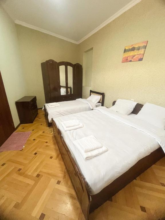 Postel nebo postele na pokoji v ubytování Hotel Vila