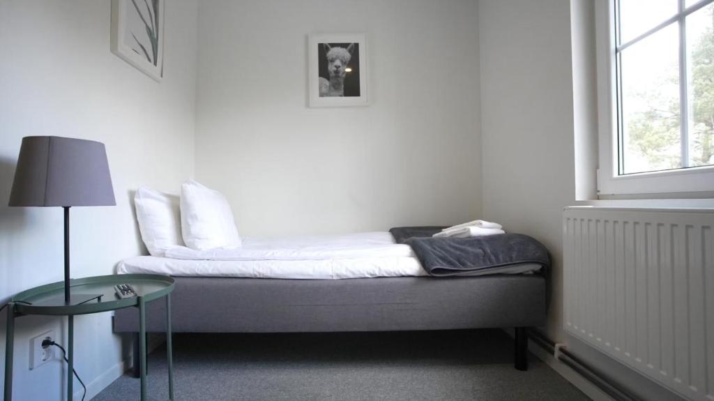 Postel nebo postele na pokoji v ubytování Forenom Hostel Gothenburg Säve