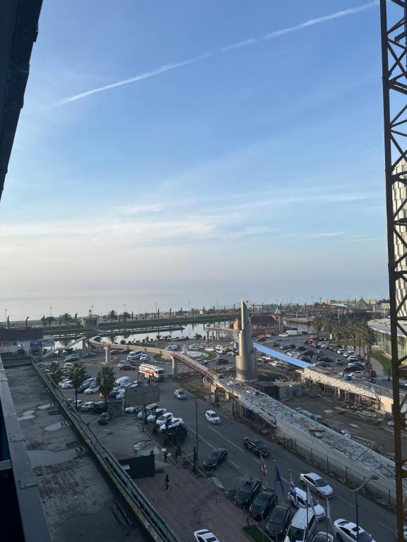 a view of a city with a bridge in the background at ORBI SITY GOOD VIEW in Batumi