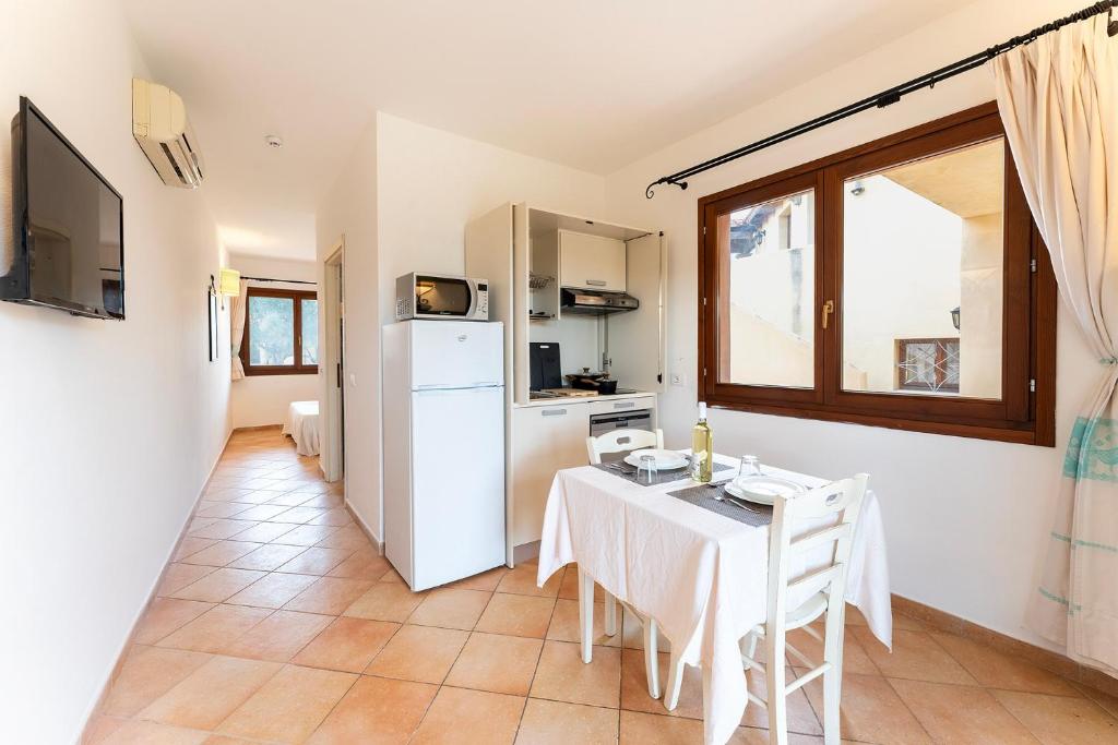 Kuchyň nebo kuchyňský kout v ubytování Résidence Pierre & Vacances Vignola Mare