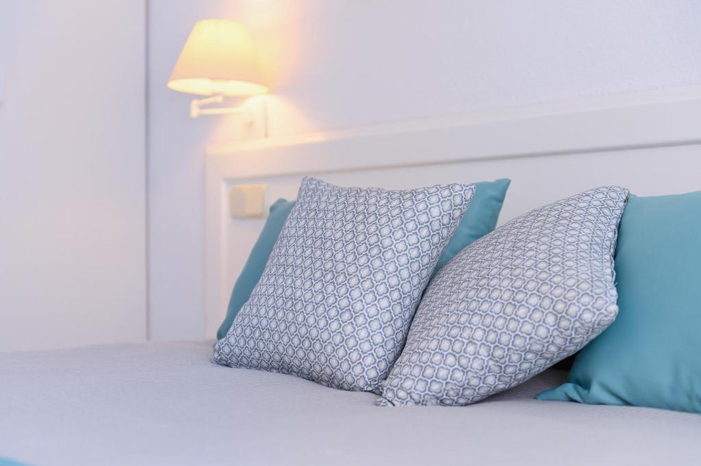 Postel nebo postele na pokoji v ubytování Valle Marina Apartamentos
