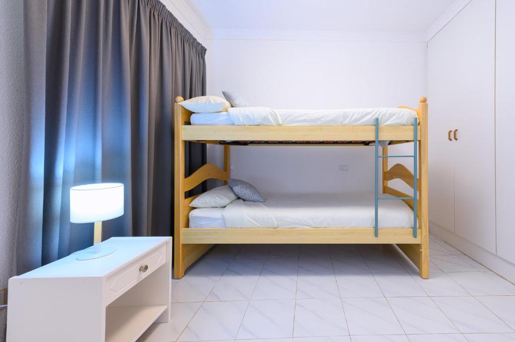 Postel nebo postele na pokoji v ubytování Valle Marina Apartamentos