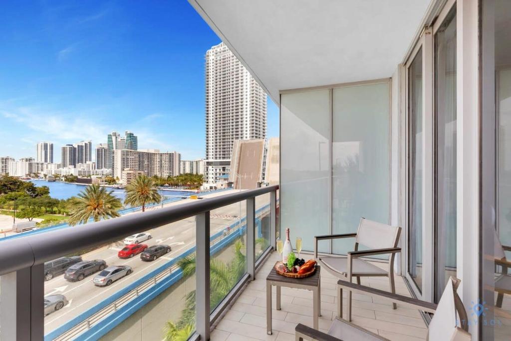 a balcony with a view of the city at Amazing Pool - Balcony - Gym - Near Beach in Hallandale Beach