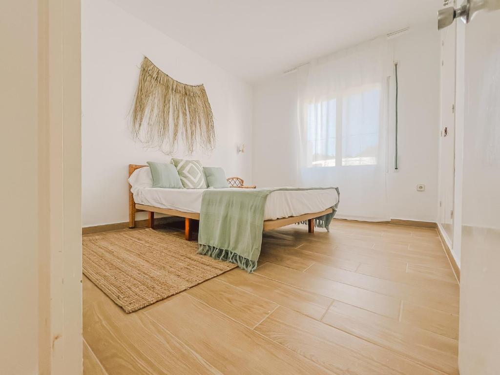 Posteľ alebo postele v izbe v ubytovaní Apartamentos Sol Naixent