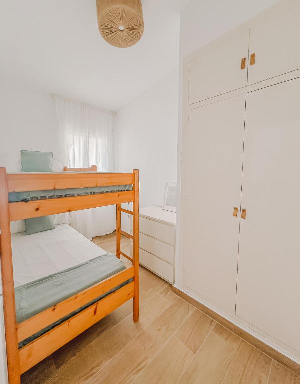 Posteľ alebo postele v izbe v ubytovaní Apartamentos Sol Naixent