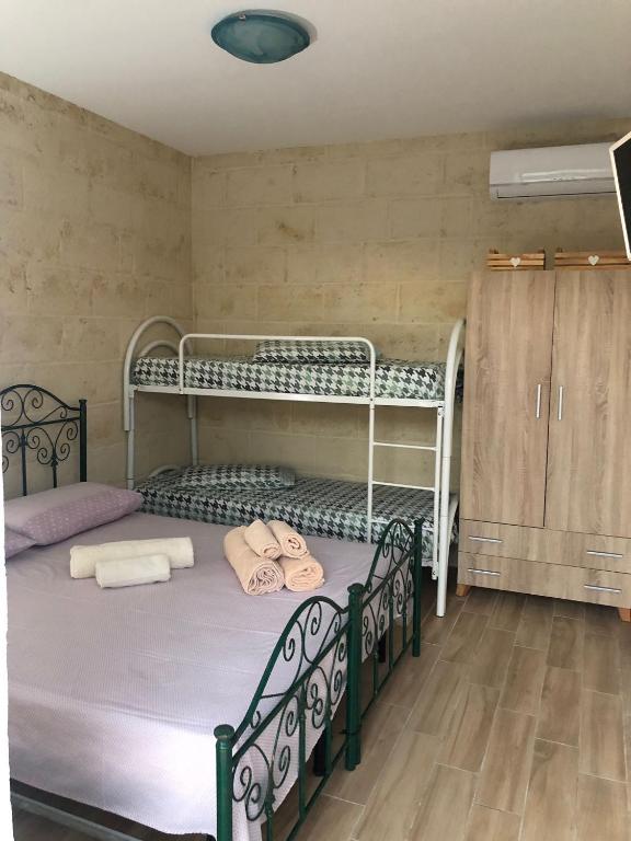 Postel nebo postele na pokoji v ubytování Salento Villa Don Peppino