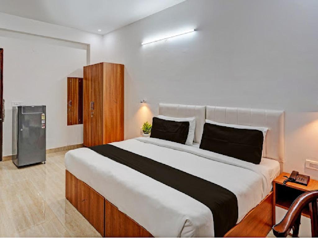 Postel nebo postele na pokoji v ubytování Akshay dream stay