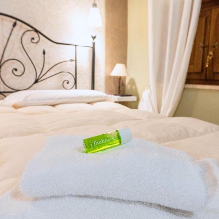 Postel nebo postele na pokoji v ubytování Al Piccolo Borgo Locanda Con Alloggio