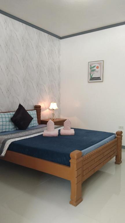 Postel nebo postele na pokoji v ubytování ELEN INN - Malapascua Island Air-conditioned Room2