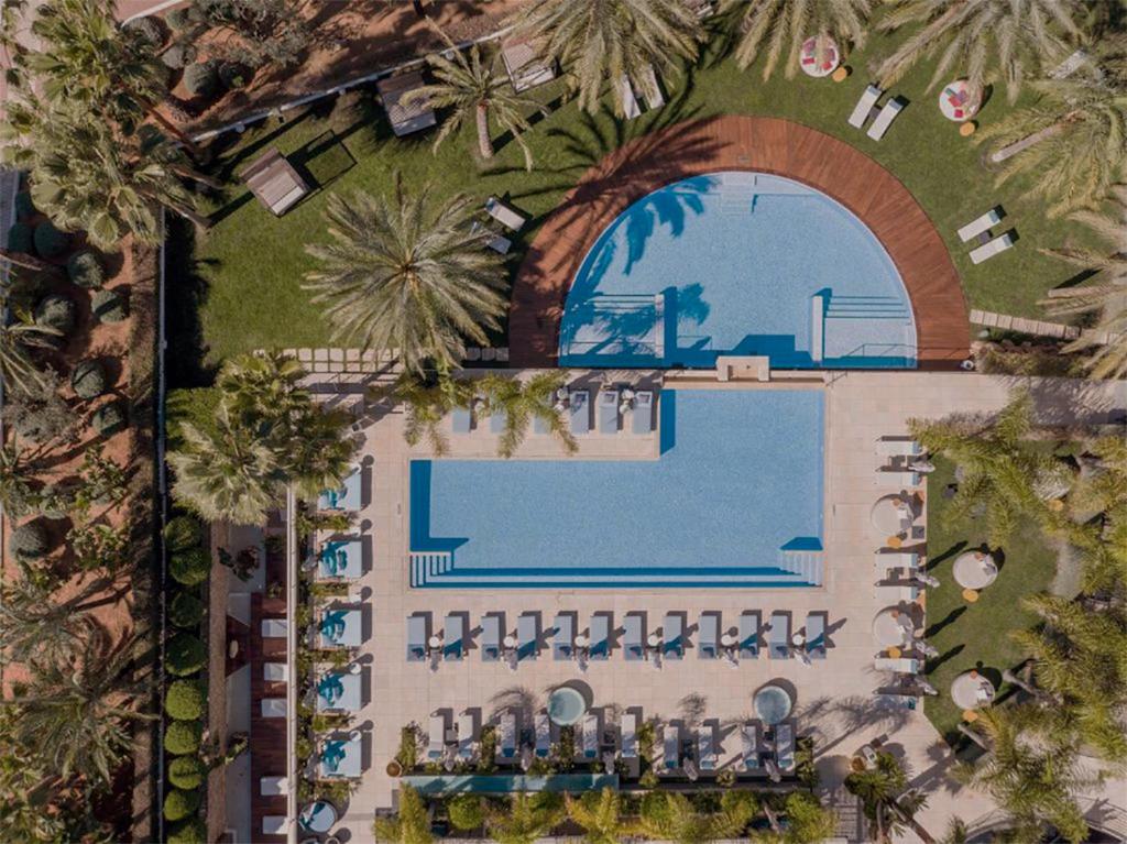 Vista de la piscina de Aguas de Ibiza Grand Luxe Hotel - Small Luxury Hotel of the World o d'una piscina que hi ha a prop