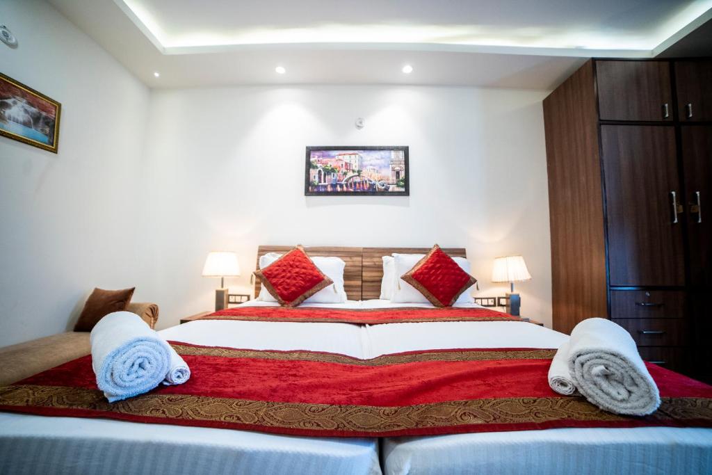 Postel nebo postele na pokoji v ubytování Hotel Gracia golf