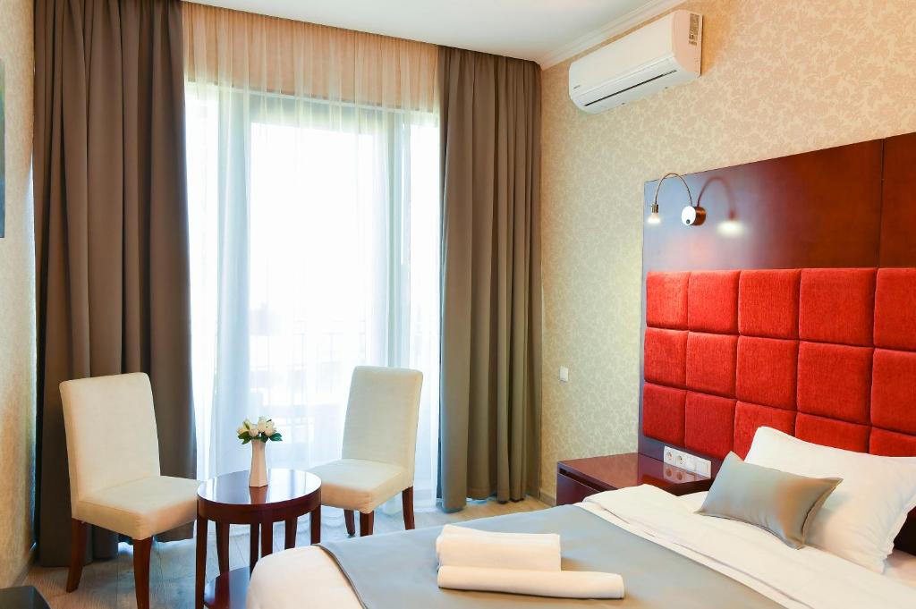 Posezení v ubytování Kraveli Hotel