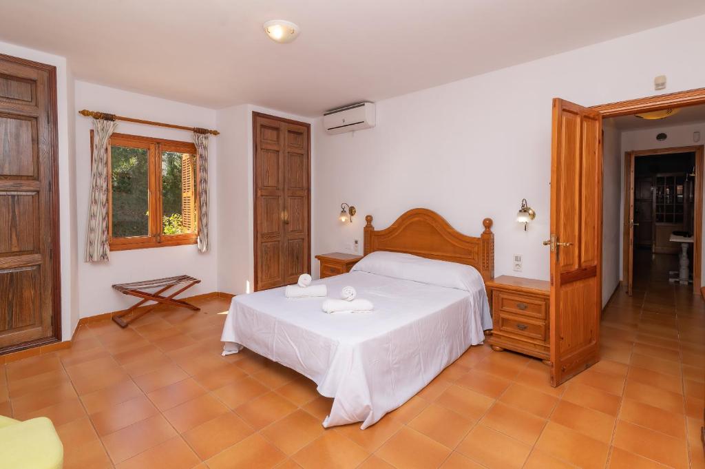 Postel nebo postele na pokoji v ubytování Villa Pi Tort by Sealand Villas
