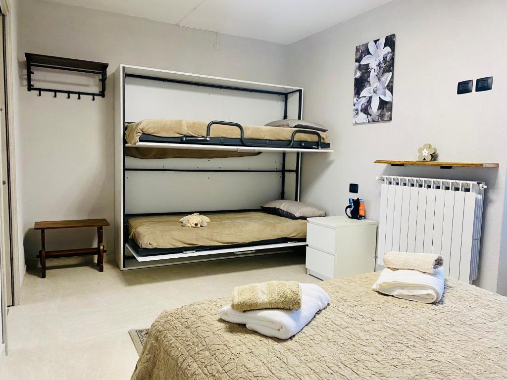 Postel nebo postele na pokoji v ubytování Ca' di Zio Tinu
