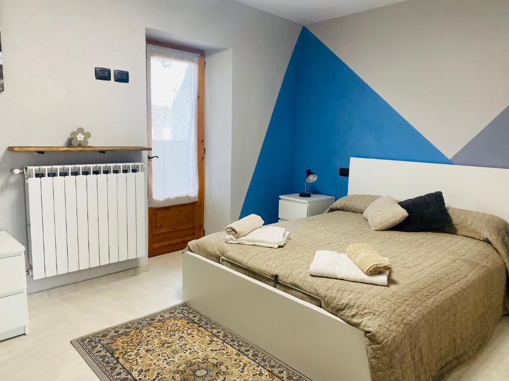 Postel nebo postele na pokoji v ubytování Ca' di Zio Tinu