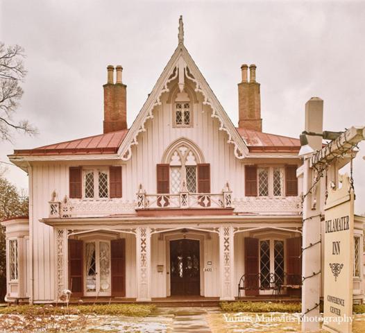 a large white house with a large turret at Beekman Arms and Delamater Inn in Rhinebeck