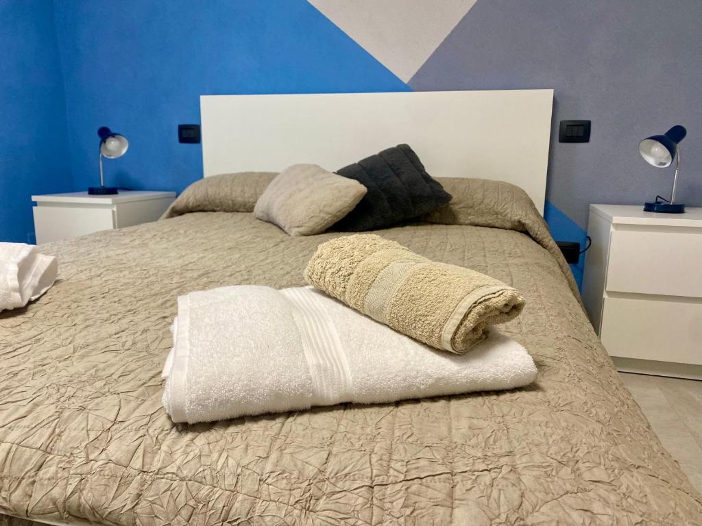 Postel nebo postele na pokoji v ubytování Ca' di Zio Tinu