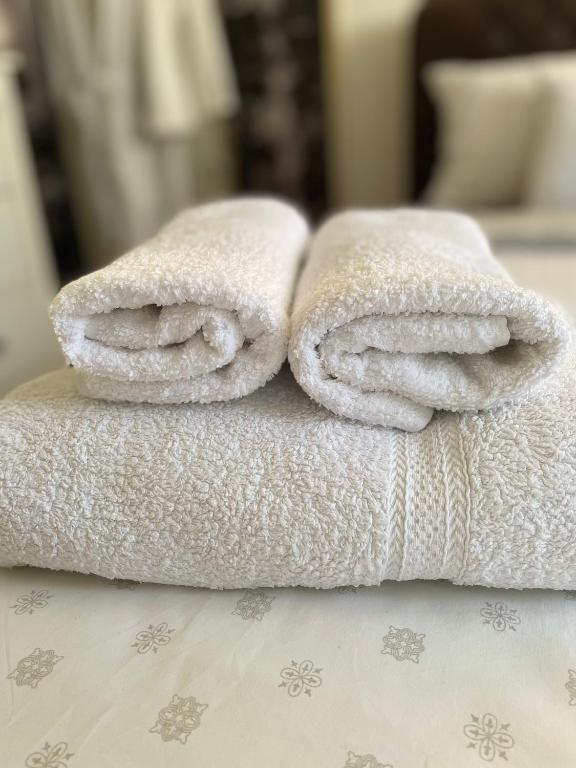 Postel nebo postele na pokoji v ubytování Charme apartman