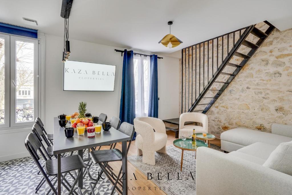 a living room with a table with fruits on it at KAZA BELLA - Maisons Alfort 7 - Large modern family flat in Maisons-Alfort