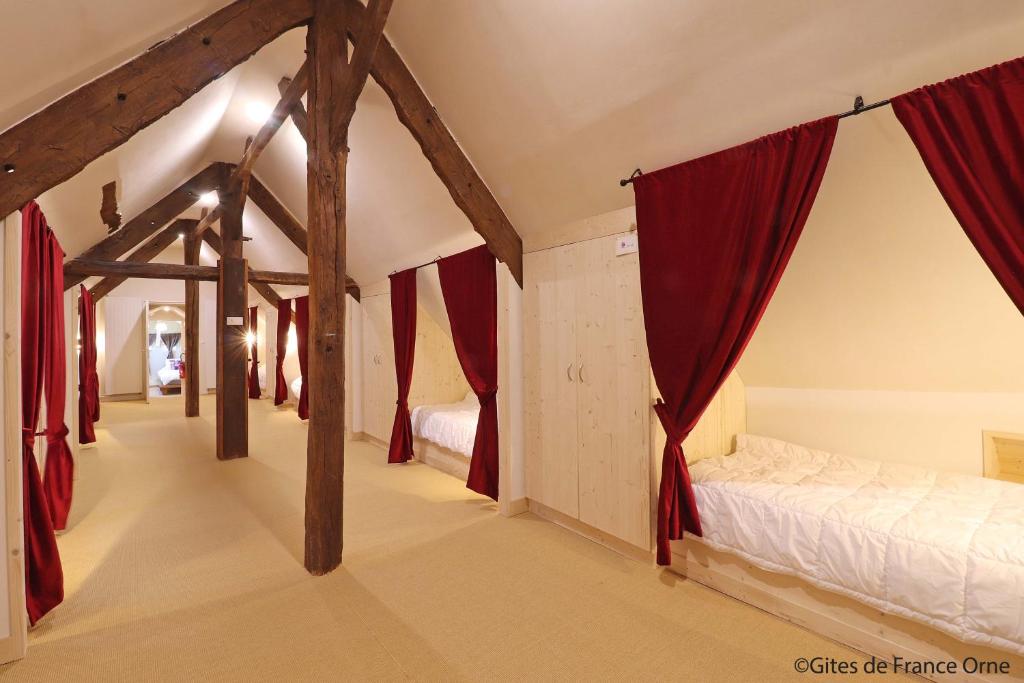 Postel nebo postele na pokoji v ubytování Domaine de la Boderie