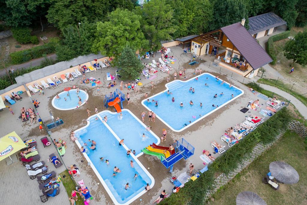 an overhead view of an amusement park with two pools at Panelovka in Bítov