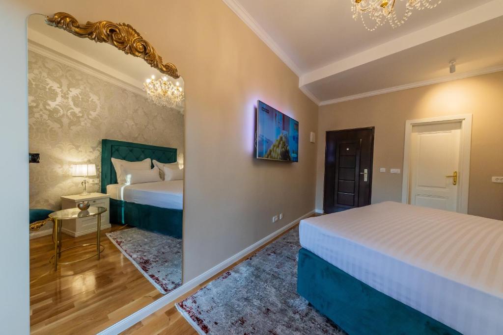 Postel nebo postele na pokoji v ubytování San Mihael luxury rooms 1