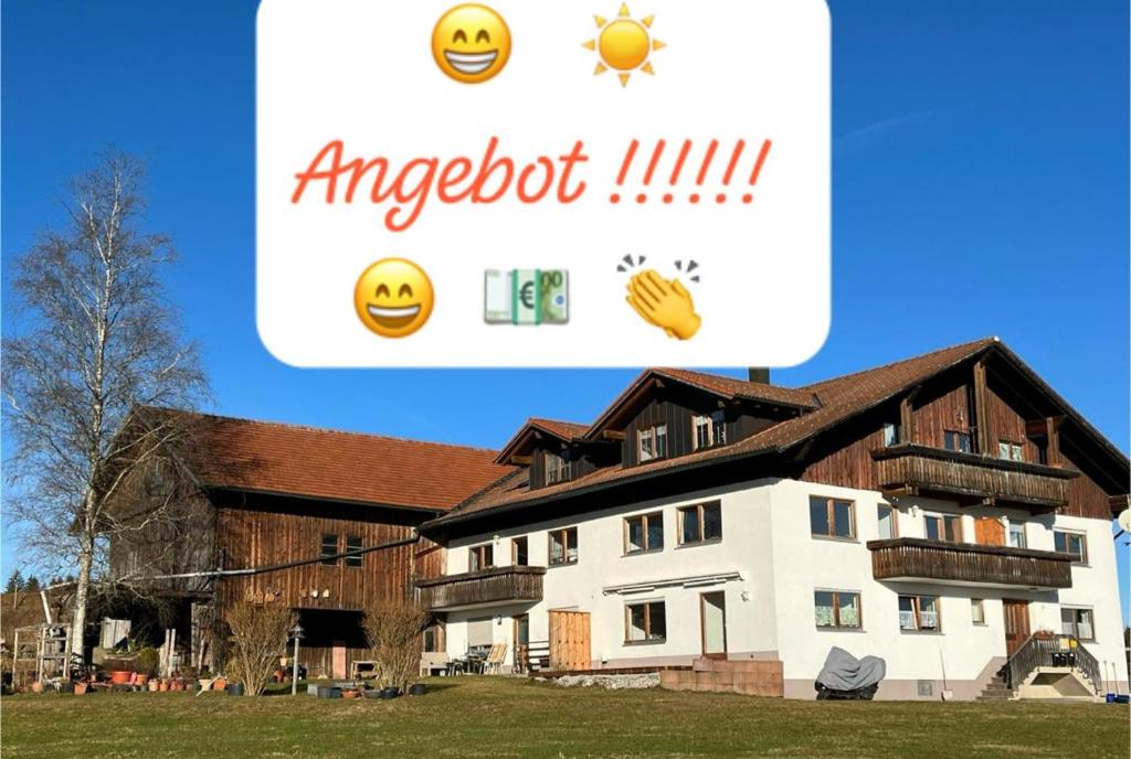 a screenshot of an apartment building with a picture of a house at Haus Allgäu Ruh in Görisried