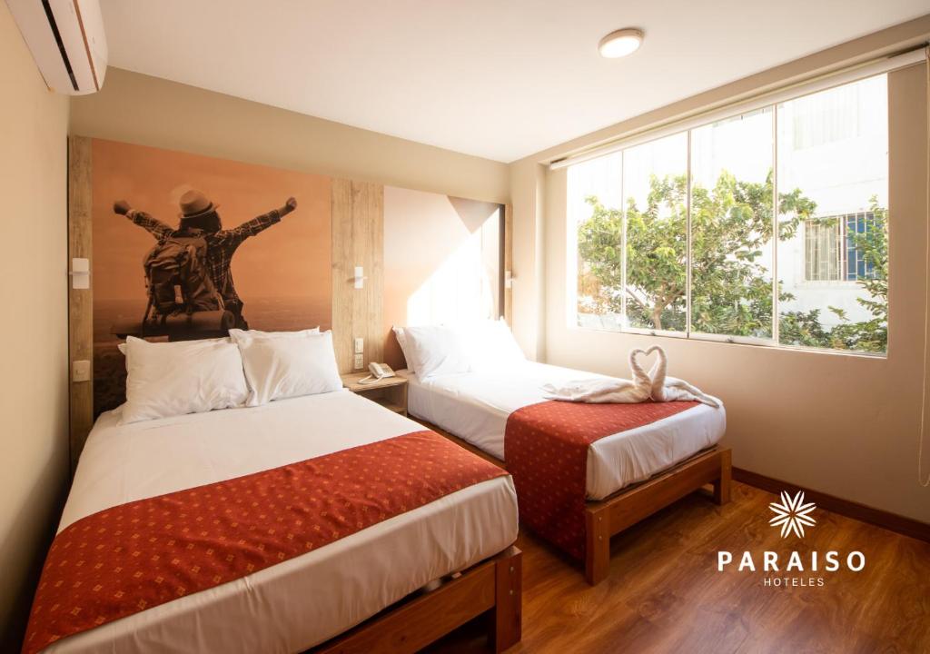 Postel nebo postele na pokoji v ubytování Hoteles Paraiso PIURA