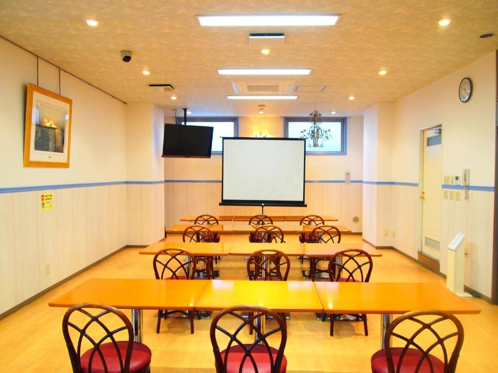 TV a/nebo společenská místnost v ubytování Hotel Sunrise21