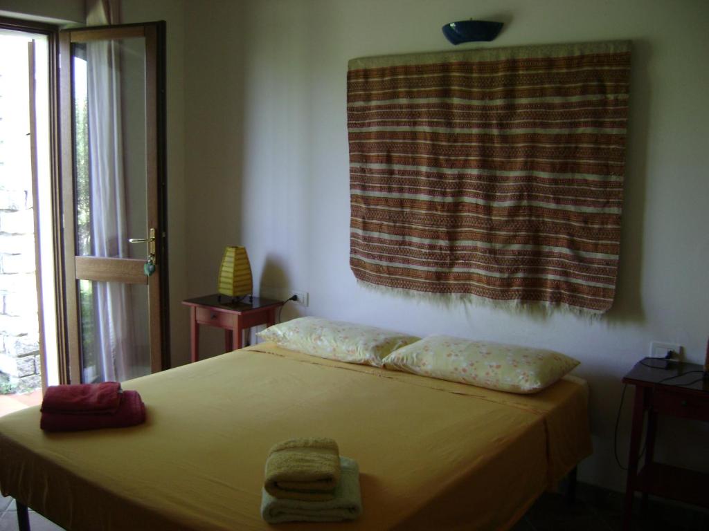 Postel nebo postele na pokoji v ubytování Hotel Sandalyon