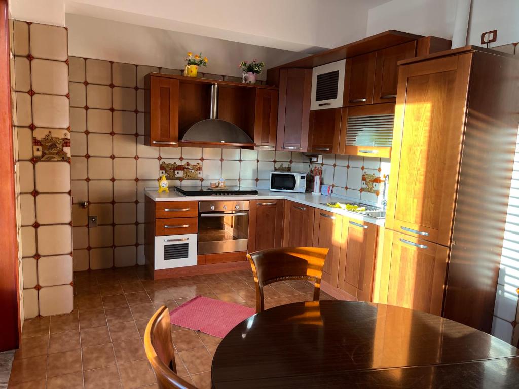 A kitchen or kitchenette at LA ROSA DEI VENTI