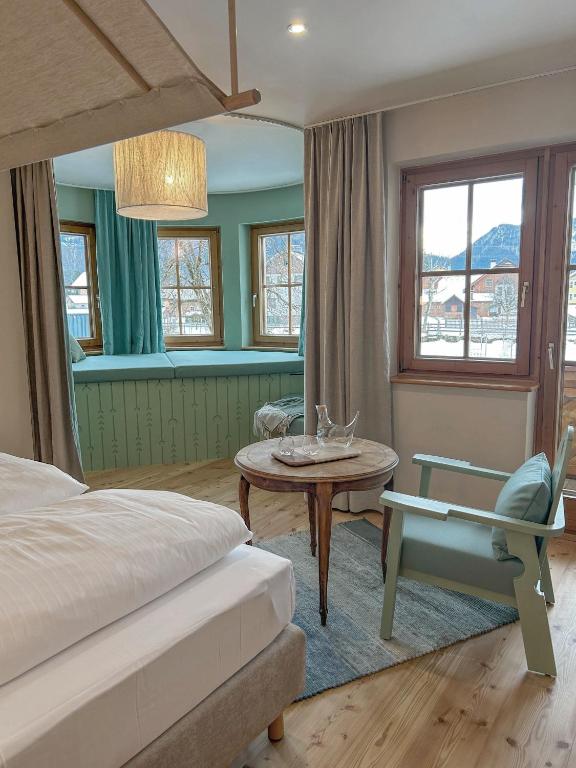 Postel nebo postele na pokoji v ubytování Hotel Kogler