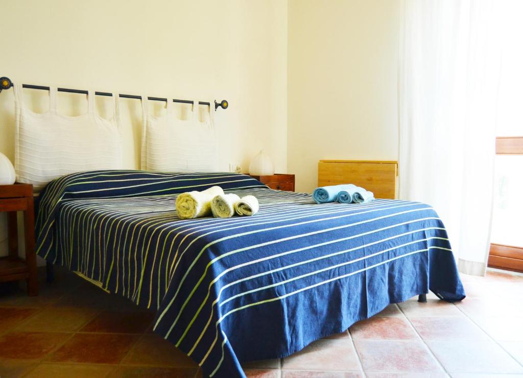 Postel nebo postele na pokoji v ubytování Hotel Sandalyon